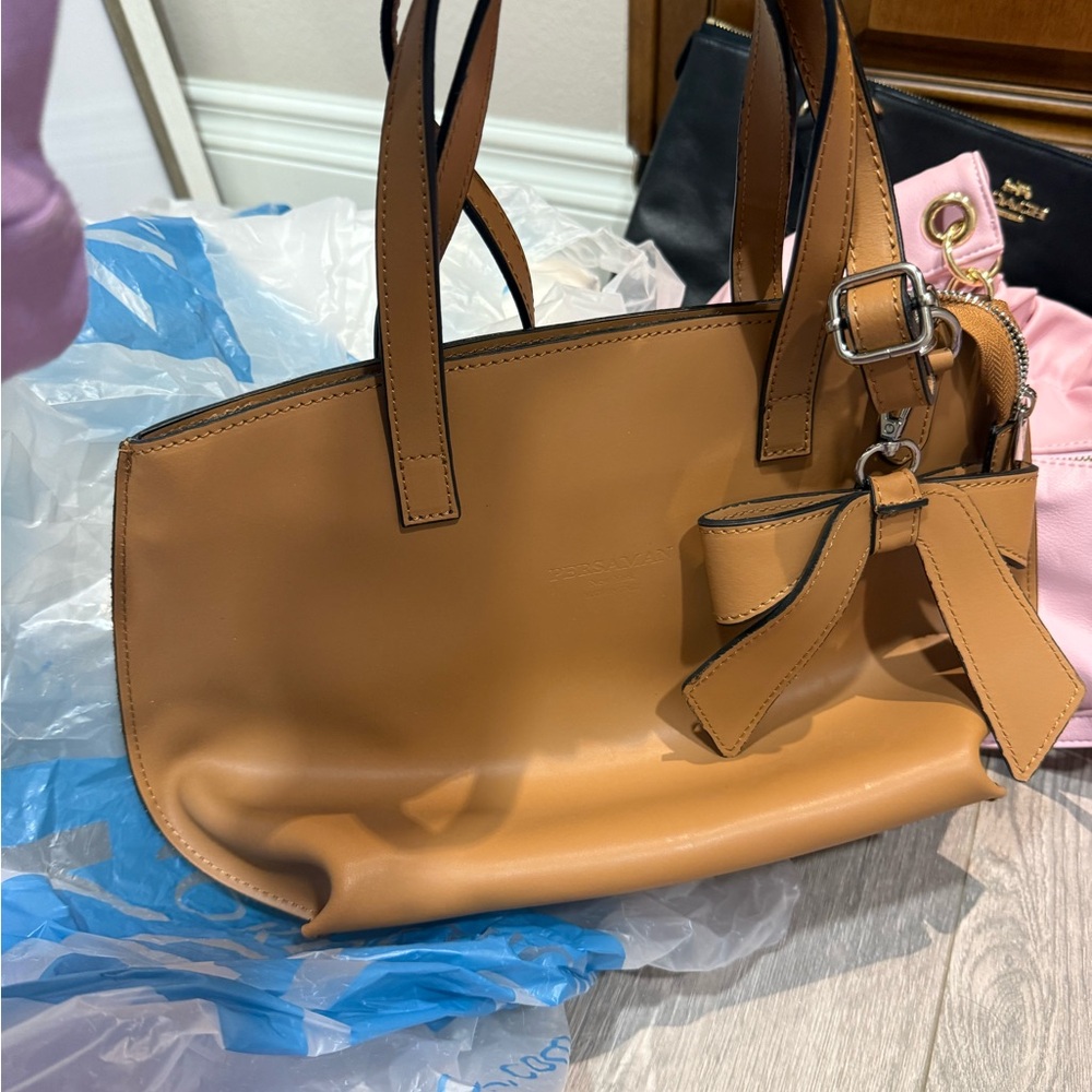 Elegant Tan Handbag with Bow Accent